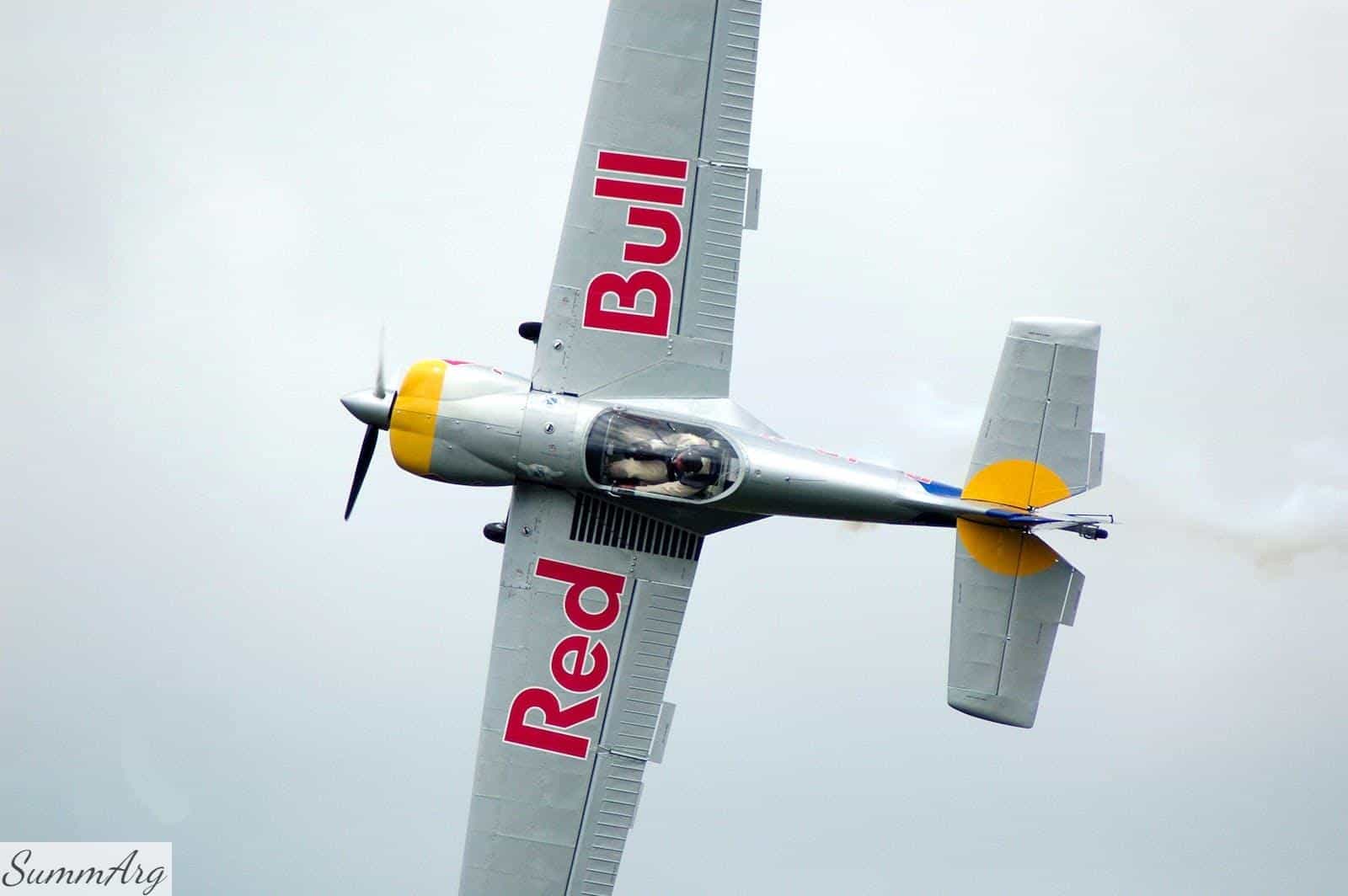 Gray Red Bull Monoplane on Mid Air
