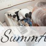 man in white shirt using white sewing machine