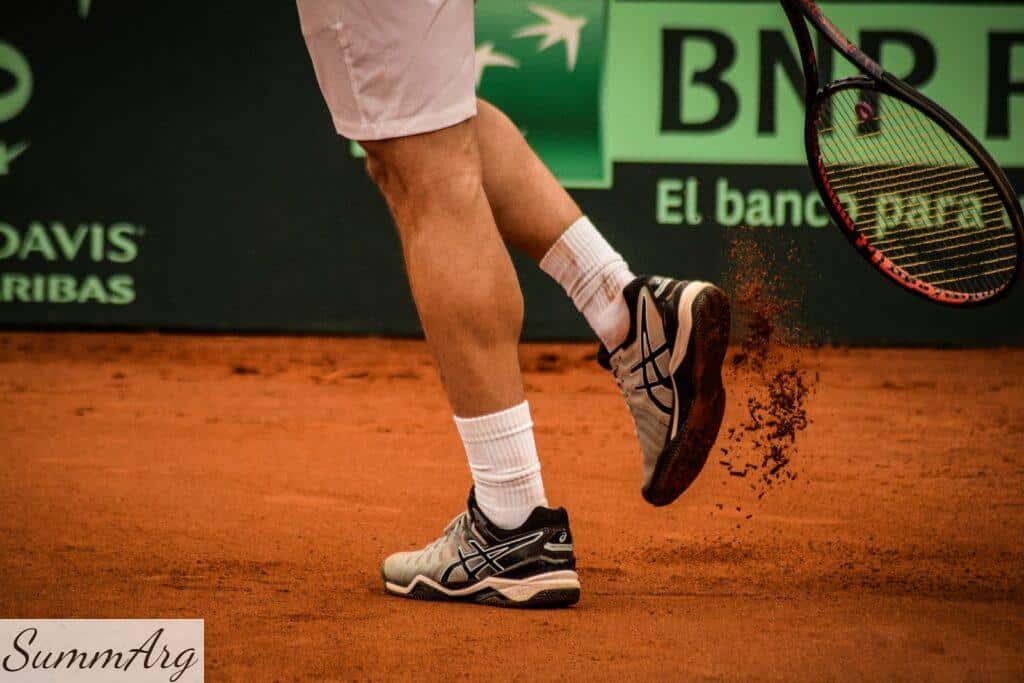 a tennis player with a tennis racket in his hand